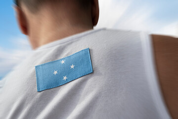 The national flag of Federated States Micronesia on the athlete's back