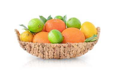 Wicker basket with citrus fruit isolated on white background