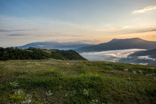 Walking in the mountains.Mount Demerdzhi in the Crimea. Sunset on the mountain. Fog in the mountains. © Elena