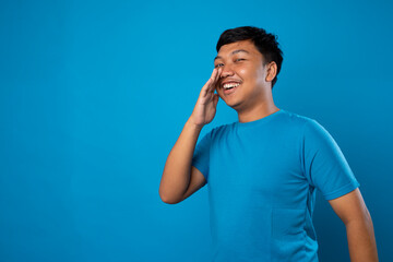 a very handsome man whispered confidently on the blue background