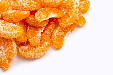 Fresh orange segments on white background.
