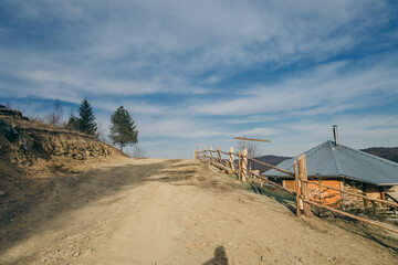 A truck driving down a dirt road