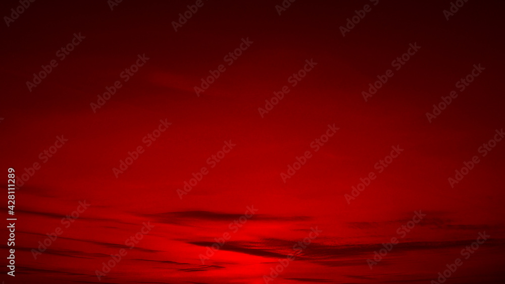 Wall mural red sunset. sky with clouds. beautiful black red abstract background with copy space for design. web