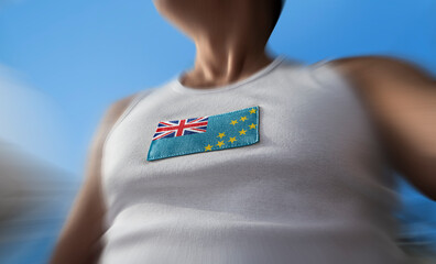 The national flag of Tuvalu on the athlete's chest