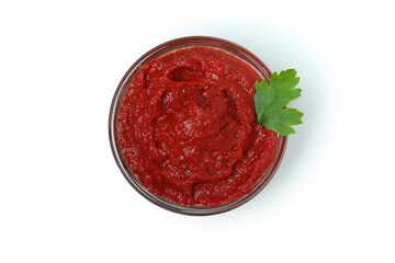 Bowl of tomato paste isolated on white background
