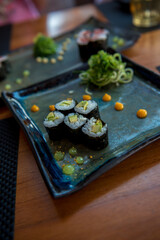 A plate of sushi in a japanese restaurant