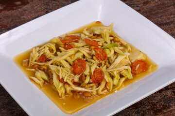 Green mango salad with seafood
