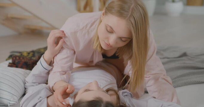 Lesbian is gently strokes the girl Lgbtq Gay Lesbian Bisexual Transgender Lesbian concept Love