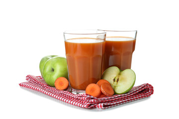 Glasses of juice and ingredients on towel isolated on white background