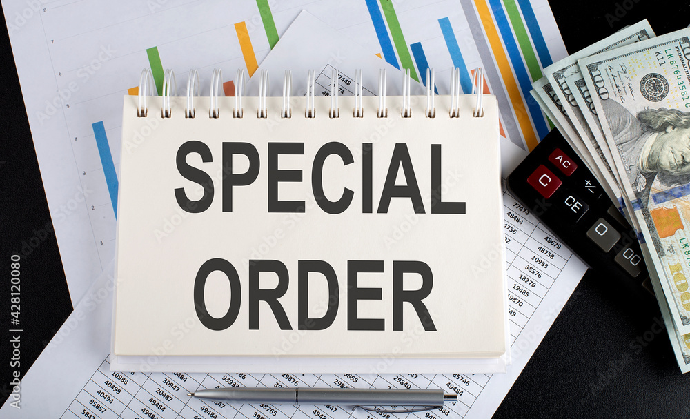 Poster special order text written on the notebook with chart,calculator and dollars