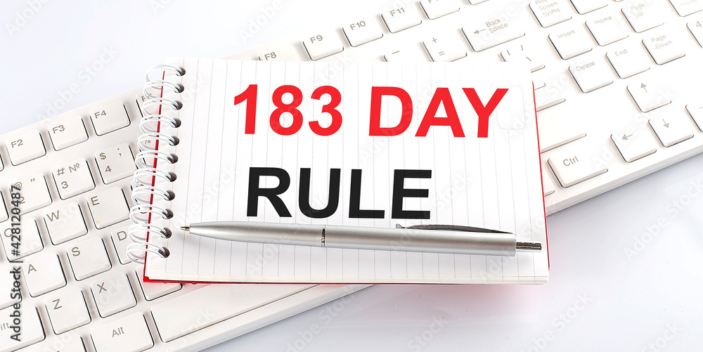 Poster text 183 day rule on keyboard on the white background