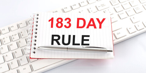 text 183 DAY RULE on keyboard on the white background