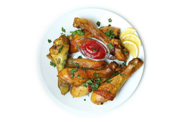 Plate of chicken drumsticks isolated on white background