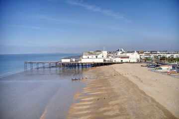 Aerial View towards Bognor Regis Pier a Victorian Building situated on a wide beach on a clear and sunny spring day at this popular tourist destination. 