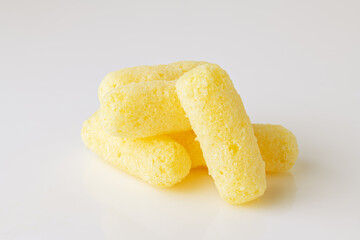 corn sticks on white background