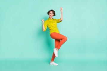 Fototapeta na wymiar Full length body size view of attractive cheerful girl dancing having fun great success isolated on bright blue color background