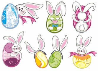 Obraz premium Set of easter eggs with funny bunnies isolated on white background