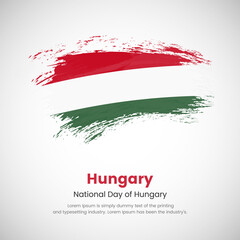 Brush painted grunge flag of Hungary country. National day of Hungary. Abstract creative painted grunge brush flag background.