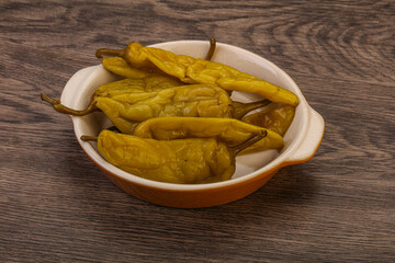 Marinated spicy and hot green pepper