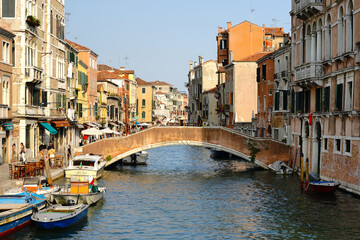Fototapeta na wymiar Bridge to Calle dei Ormesini crossing rio della Misericordia, Venice, Metropolitan City of Venice, Italy.