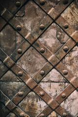 Old medieval metal gate background.