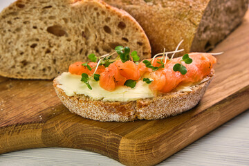 Grain yeast-free bread butter, microgreen and fish