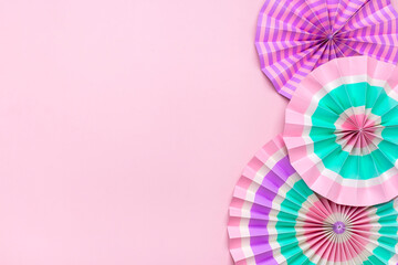 Traditional Japaneses festival paper fan with pink, turquoise, white stripes Birthday party, celebration holidays concept Abstract background Wall decor Banner - obrazy, fototapety, plakaty