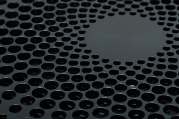 Mesh in black plastic surface