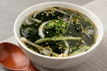 Sweet and sour soup with cucumber and seaweed