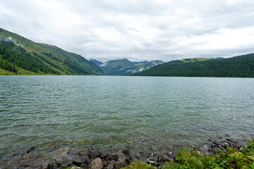 Taimenye Lake in Katun's national park. Mountain Lake. Altai, Siberia, Russia.