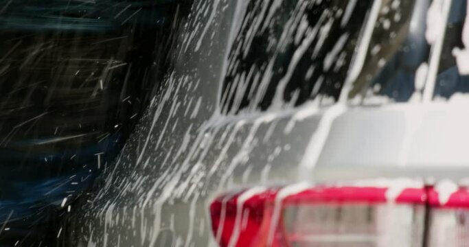 automatic car wash. large machine parts at the car wash. UHD video