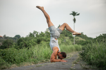 Man practice Yoga practice and meditation outdoor