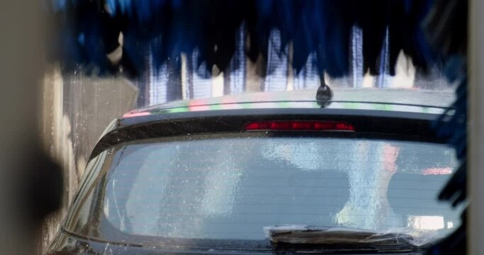 automatic car wash. large machine parts at the car wash. UHD video
