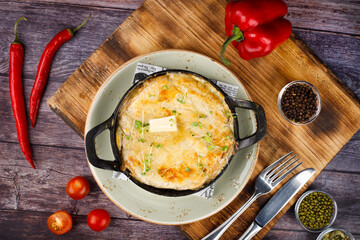 Classic French onion soup with grated cheese and parsley.