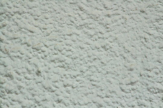 Plaster background, textured gray plaster wall, copy space, text space