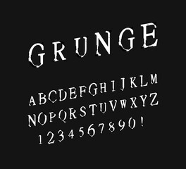 Font of grunge letters and numbers