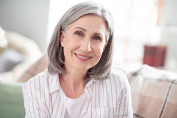 Photo of happy positive old lady smile good mood face weekend free time indoors inside house home flat apartment