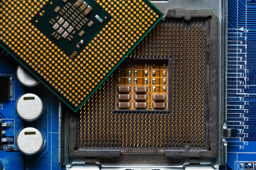 close-up of a printed circuit board with microchips and radio parts with a processor. Background...