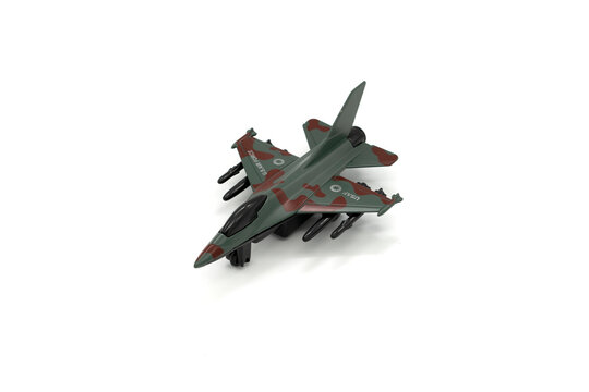 Plastic Toy Military Jet Plane On White Background.