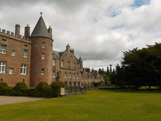 Fototapeta na wymiar The spectacular Glamis Castle and gardens in summer, Scotland 