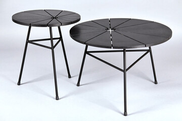 Round tables which were shot in studio with flash light on a grey background