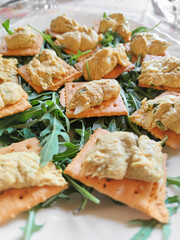 salted cracker with salad and cream