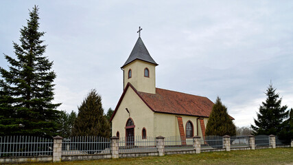 Fototapeta na wymiar The photos show a general view of the Roman Catholic branch church of Saint Joseph in the village of Stożne in Masuria, Poland.