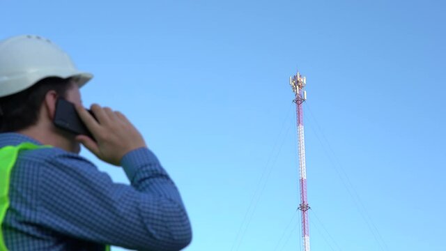 Cellular Engineer next to the Mast