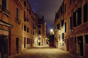 Fototapeta premium A street of Cannaregio, Venice, Italy, by night.