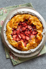 tart with strawberries. Copy space, top view.
