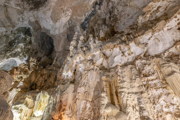 Underground caves (Frasassi Caves) with stalactites and stalagmites. Marche, Italy