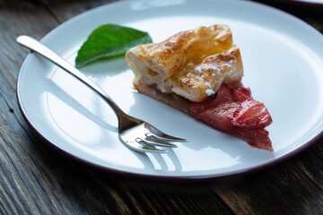 tart with strawberries on a wooden table. Copy space, top view.