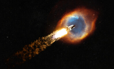 Spaceship flies in space towards the colored nebula. Space rocket with blast and puffs of smoke...
