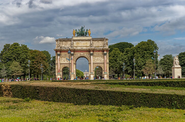 Fototapeta na wymiar Arc De Triumphs The Carousel And Garden Tuileries, Ile De France, France